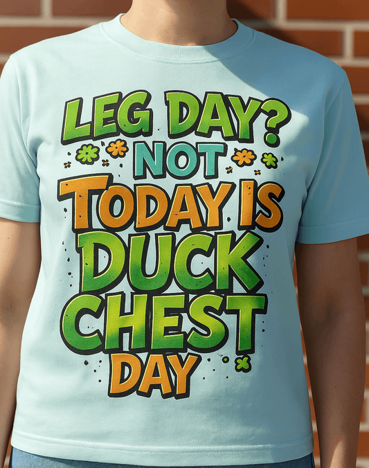 Light blue t-shirt with funny text "Leg Day? Not today – it's Duck Chest Day!" – humorous gym shirt for lifters