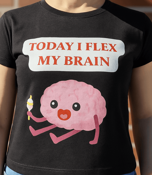 Black t-shirt with pink cartoon brain and quote "Today I flex my brain" – fun geek-style design for smart minds